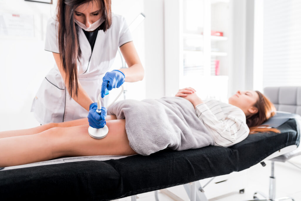 Anti-cellulite treatment at medical spa center, vacuum massage procedure